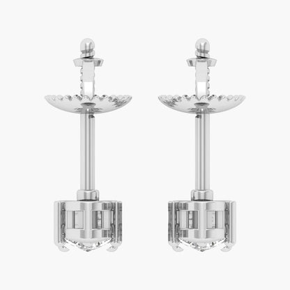 Pair of silver earrings with intricate designs on a white background