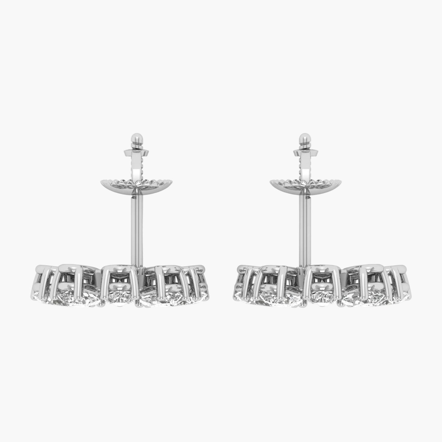 Pair of silver earrings with clear gemstones on a white background