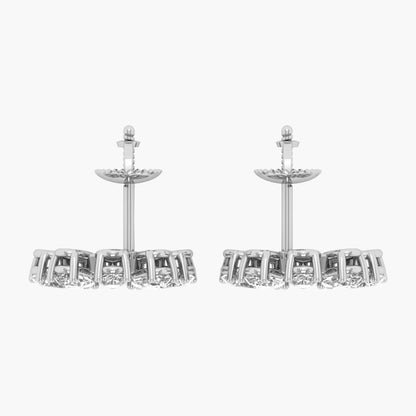 Pair of silver earrings with clear gemstones on a white background