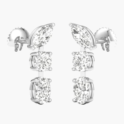 Pair of silver earrings with clear gemstones on a white background