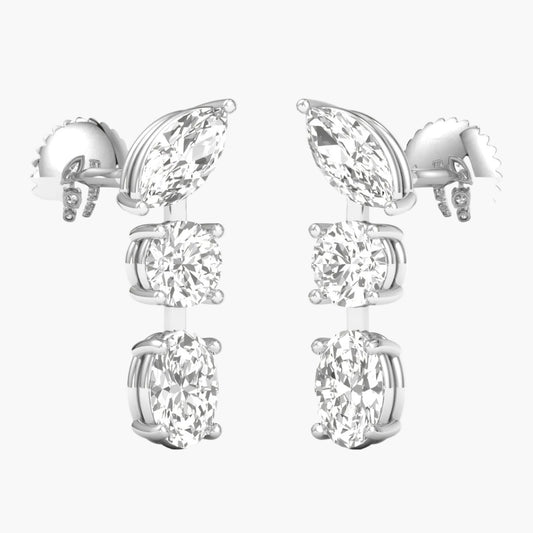 Pair of silver earrings with clear gemstones on a white background