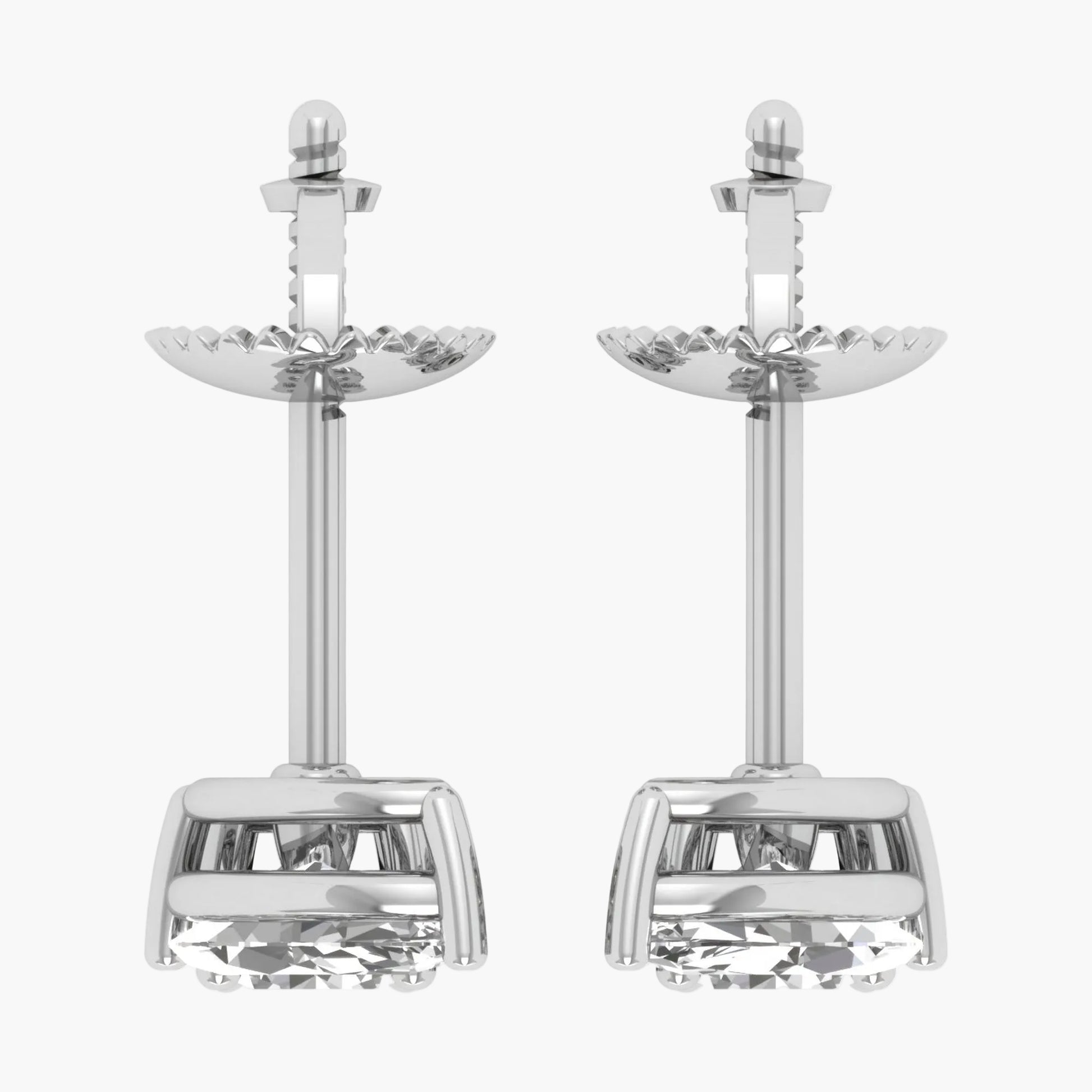 Pair of silver earrings on a white background