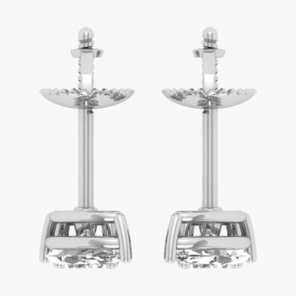 Pair of silver earrings on a white background