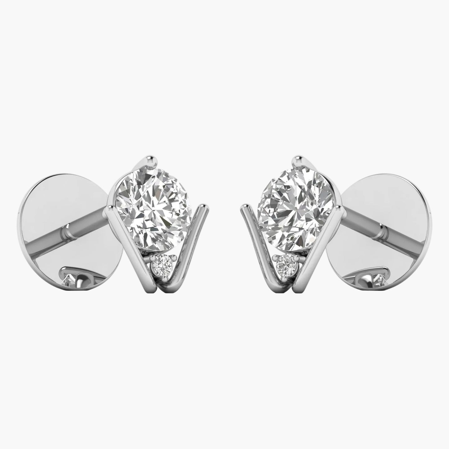 Pair of diamond stud earrings on a white background