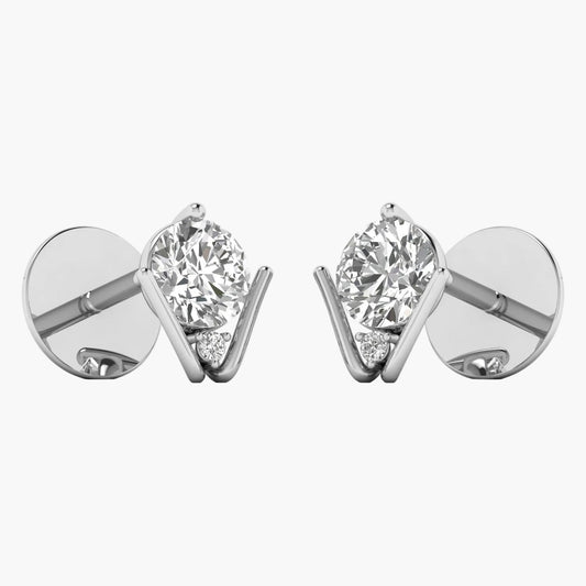 Pair of diamond stud earrings on a white background