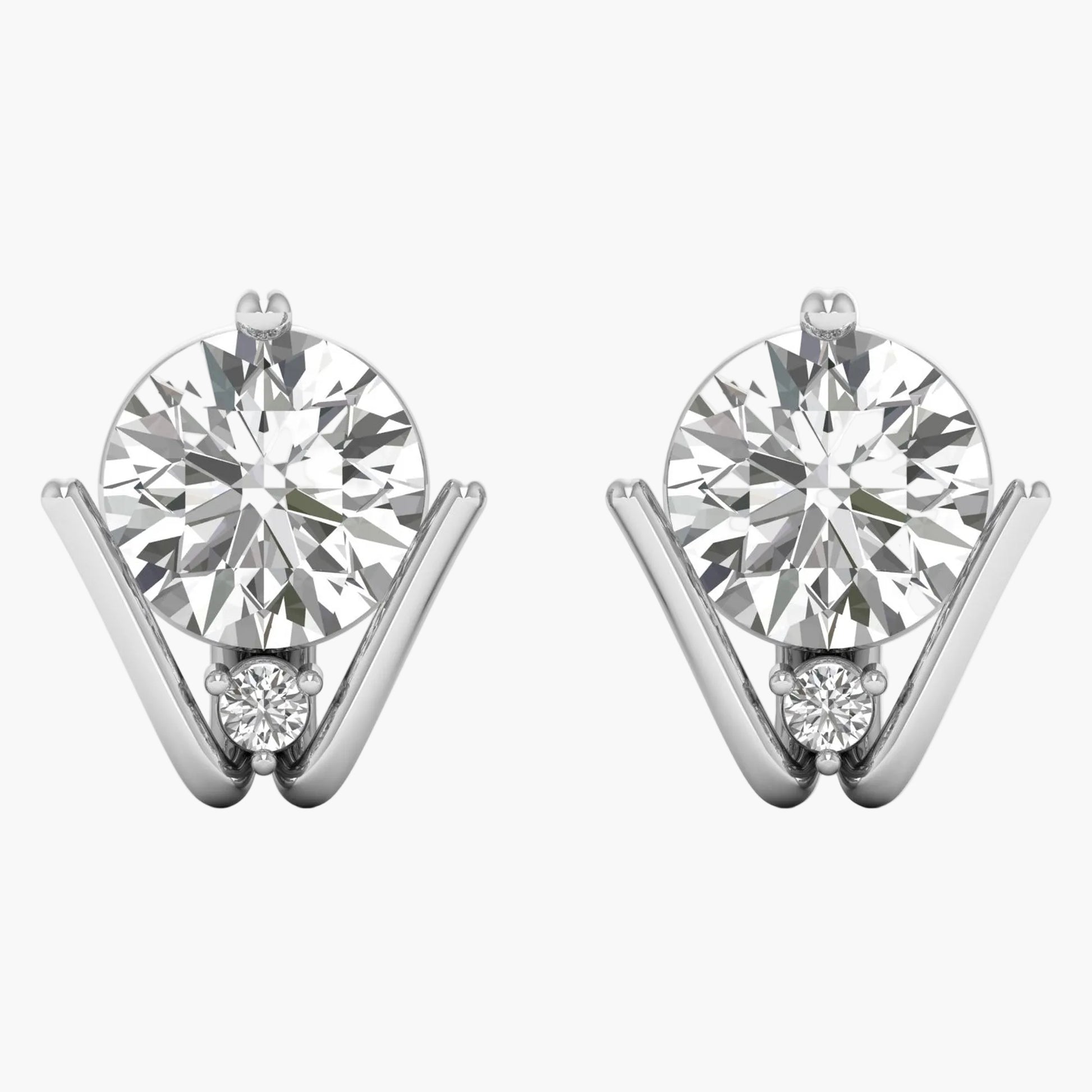 Pair of diamond earrings on a white background