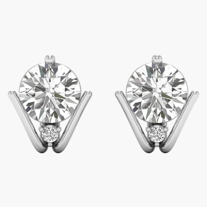 Pair of diamond earrings on a white background