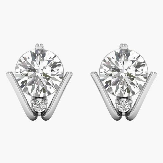 Pair of diamond earrings on a white background