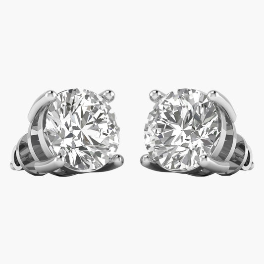 Pair of diamond stud earrings on a white background