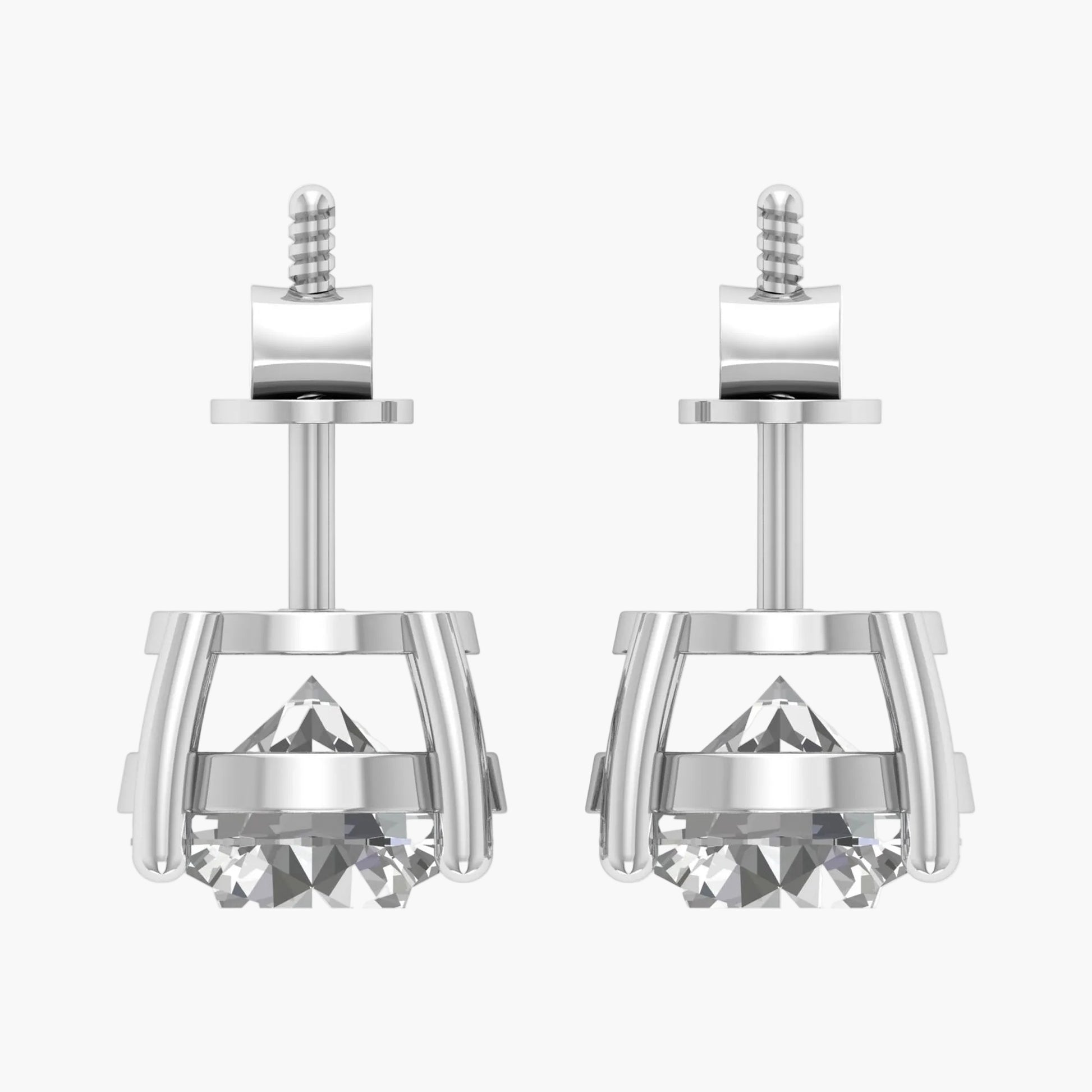 Pair of silver earrings with a clear gemstone on a white background