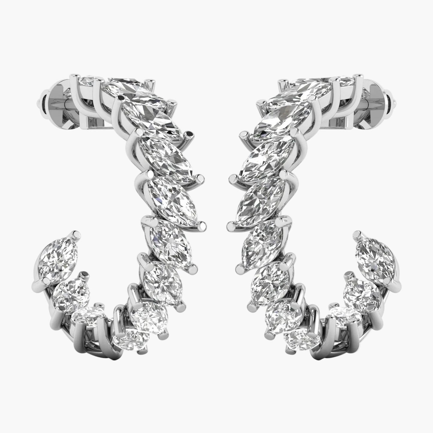 Diamond hoop earrings on a white background