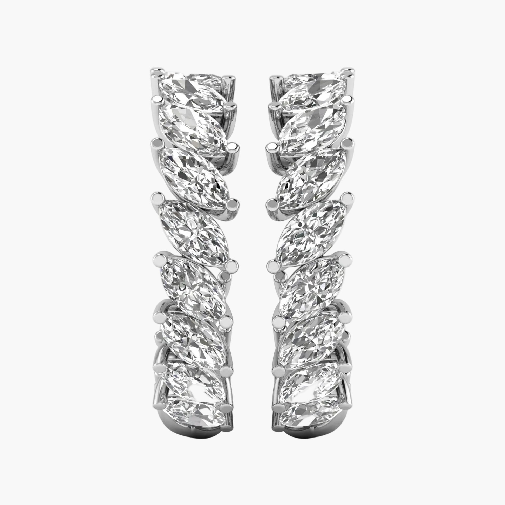 Pair of diamond earrings on a white background