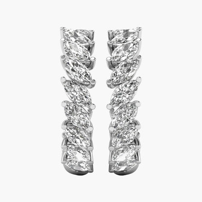 Pair of diamond earrings on a white background