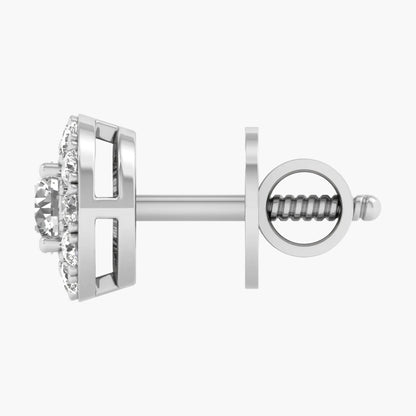 Silver earring with clear gemstones on a white background