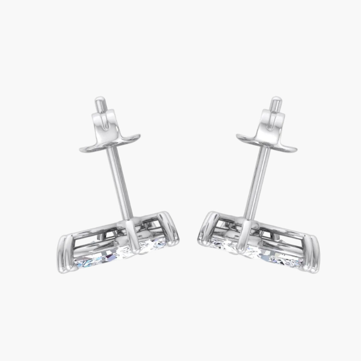 Pair of silver earrings on a white background