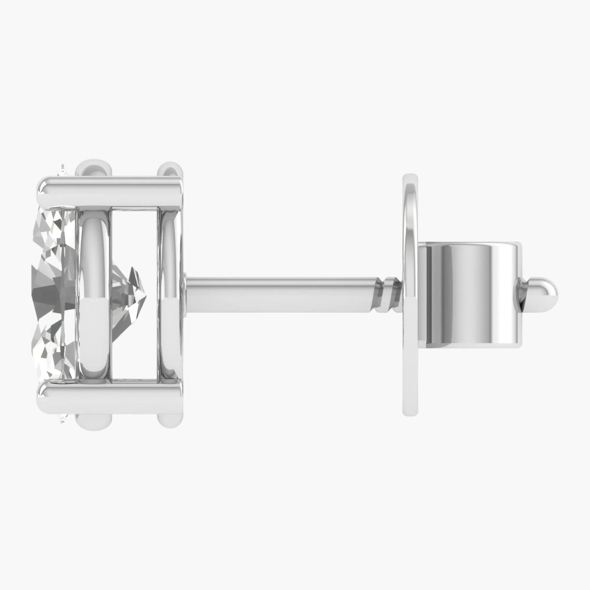 Silver earring with a clear gemstone on a white background