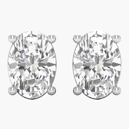 Pair of diamond stud earrings on a white background