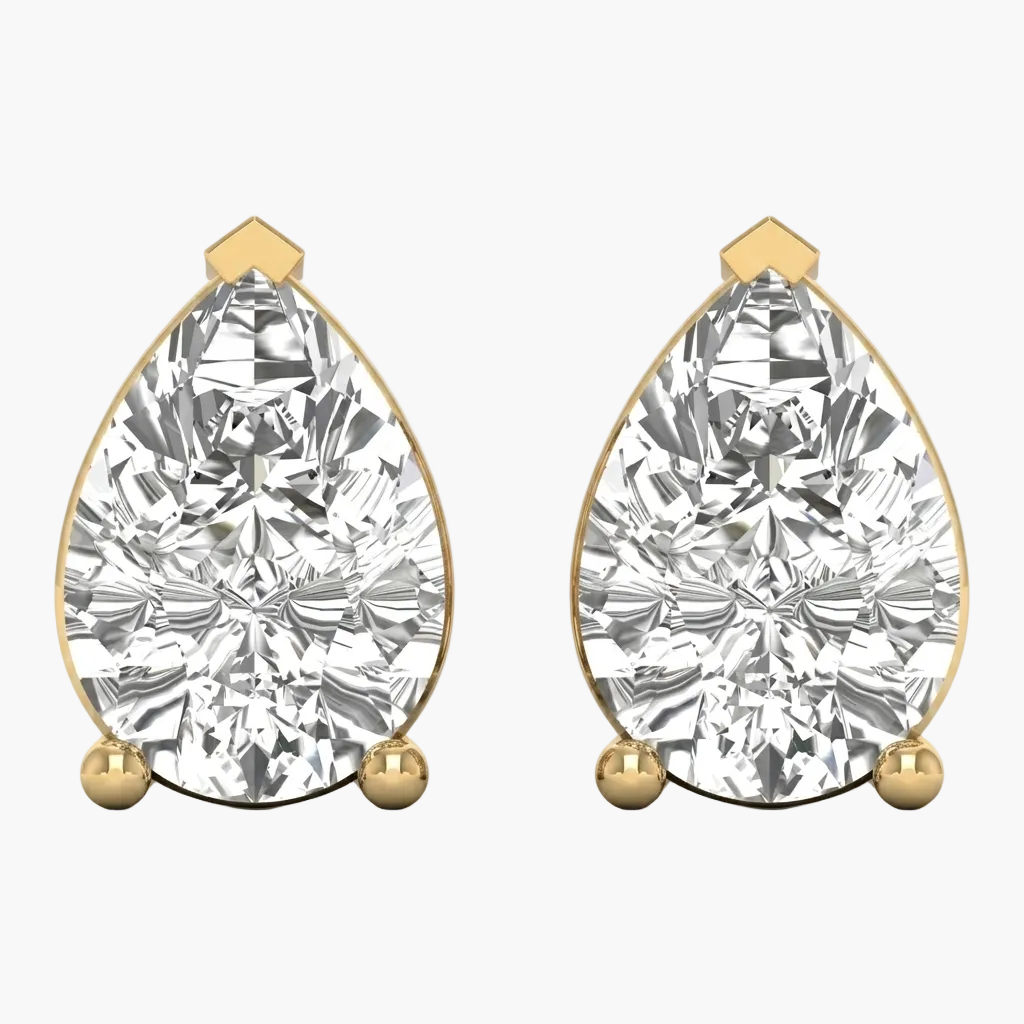 Pair of gold and diamond earrings on a white background