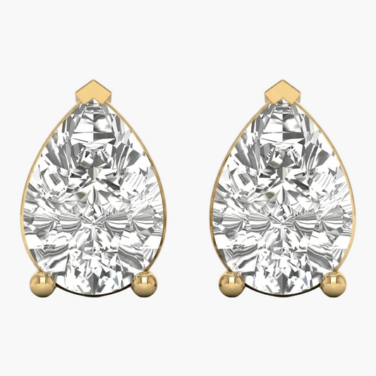 Pair of gold and diamond earrings on a white background