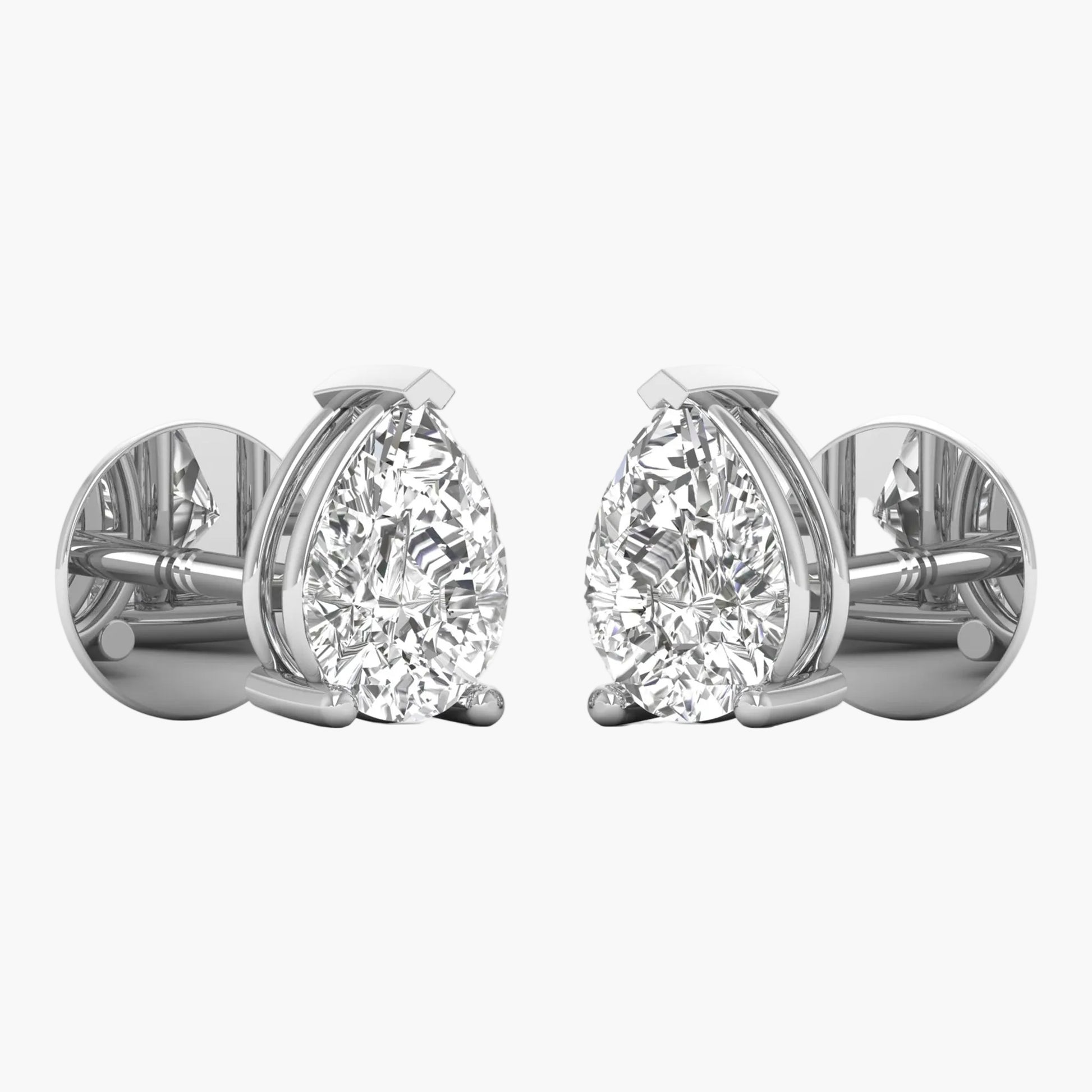Pair of diamond stud earrings on a white background