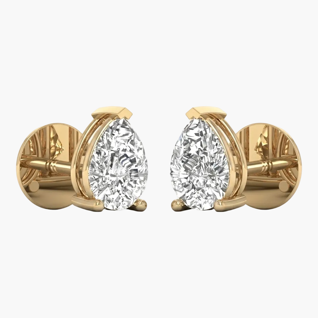 Gold earrings with pear-shaped diamonds on a white background