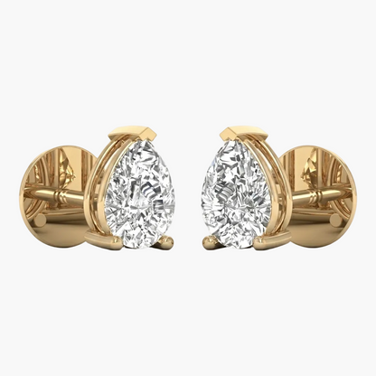 Gold earrings with pear-shaped diamonds on a white background