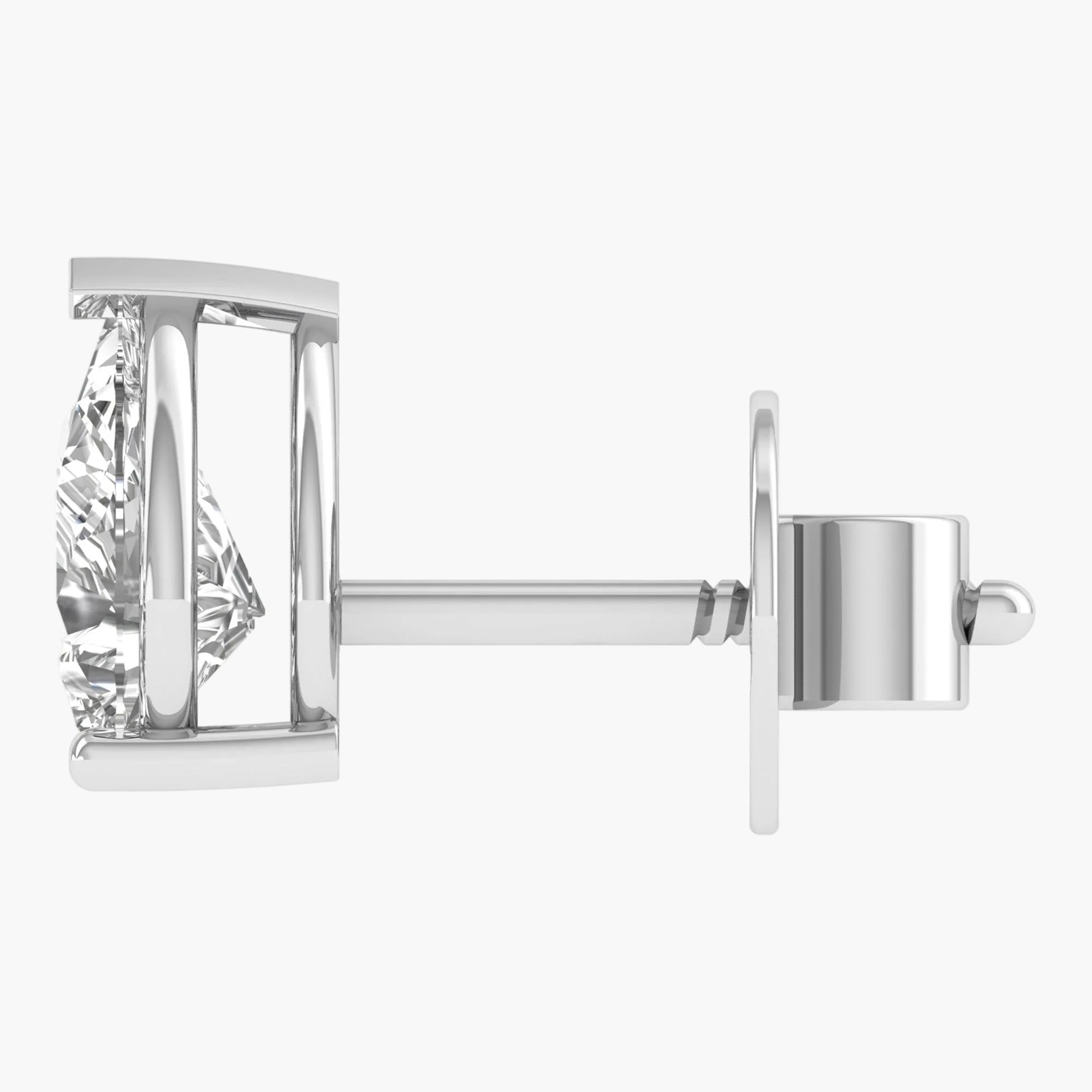 Silver earring with a clear gemstone on a white background