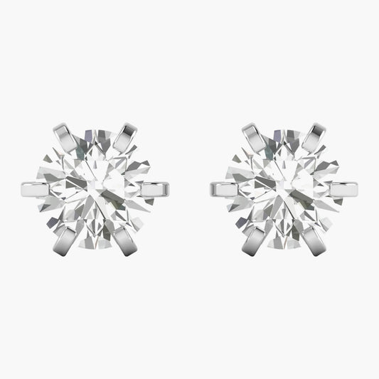 Pair of diamond stud earrings on a white background