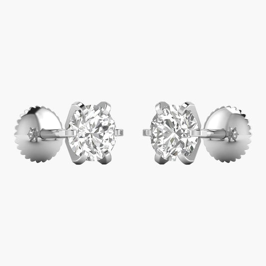 Pair of diamond stud earrings on a white background