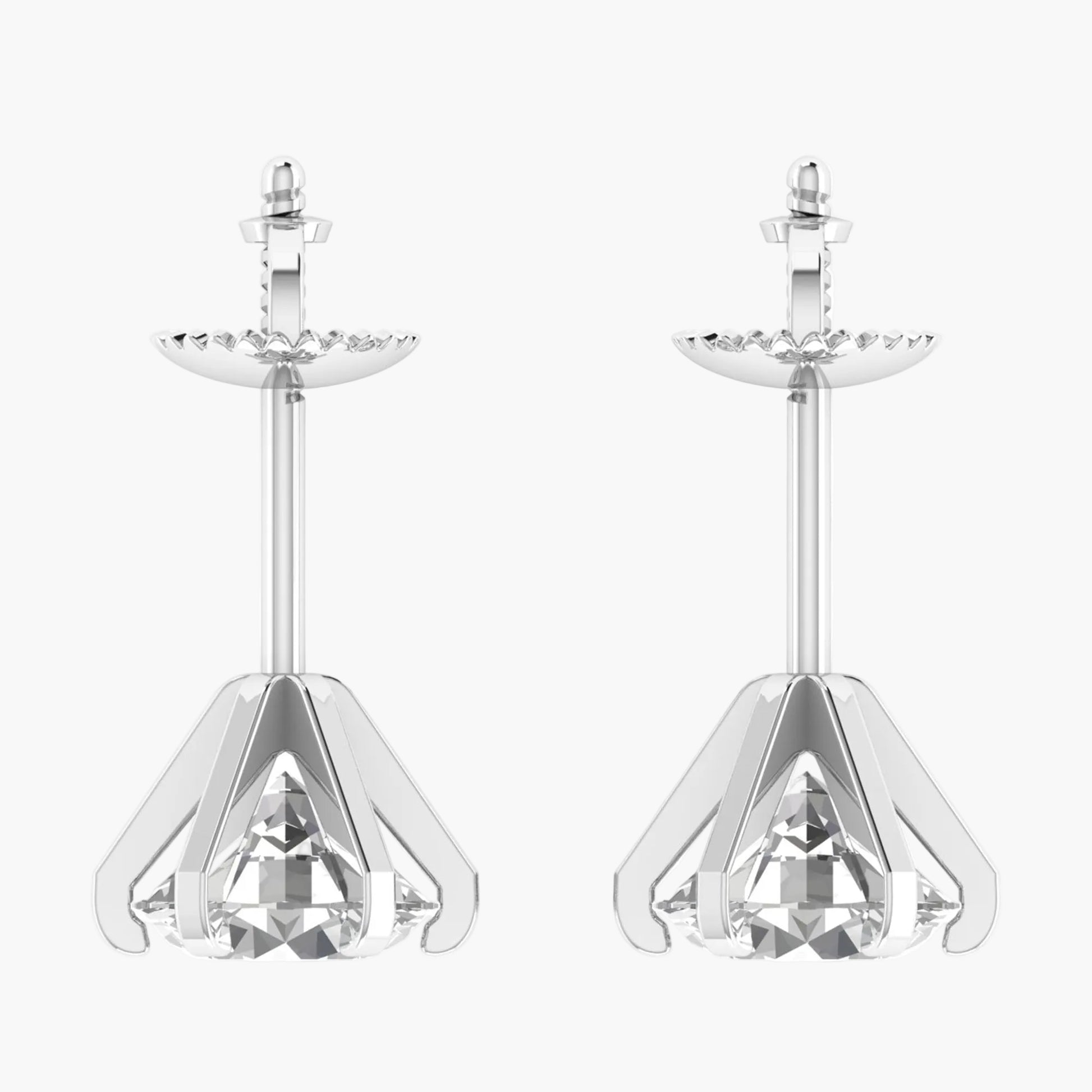 Pair of silver earrings with clear gemstones on a white background