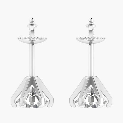 Pair of silver earrings with clear gemstones on a white background