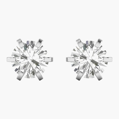 Pair of diamond stud earrings on a white background