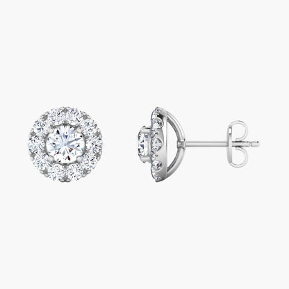Pair of diamond stud earrings on a white background