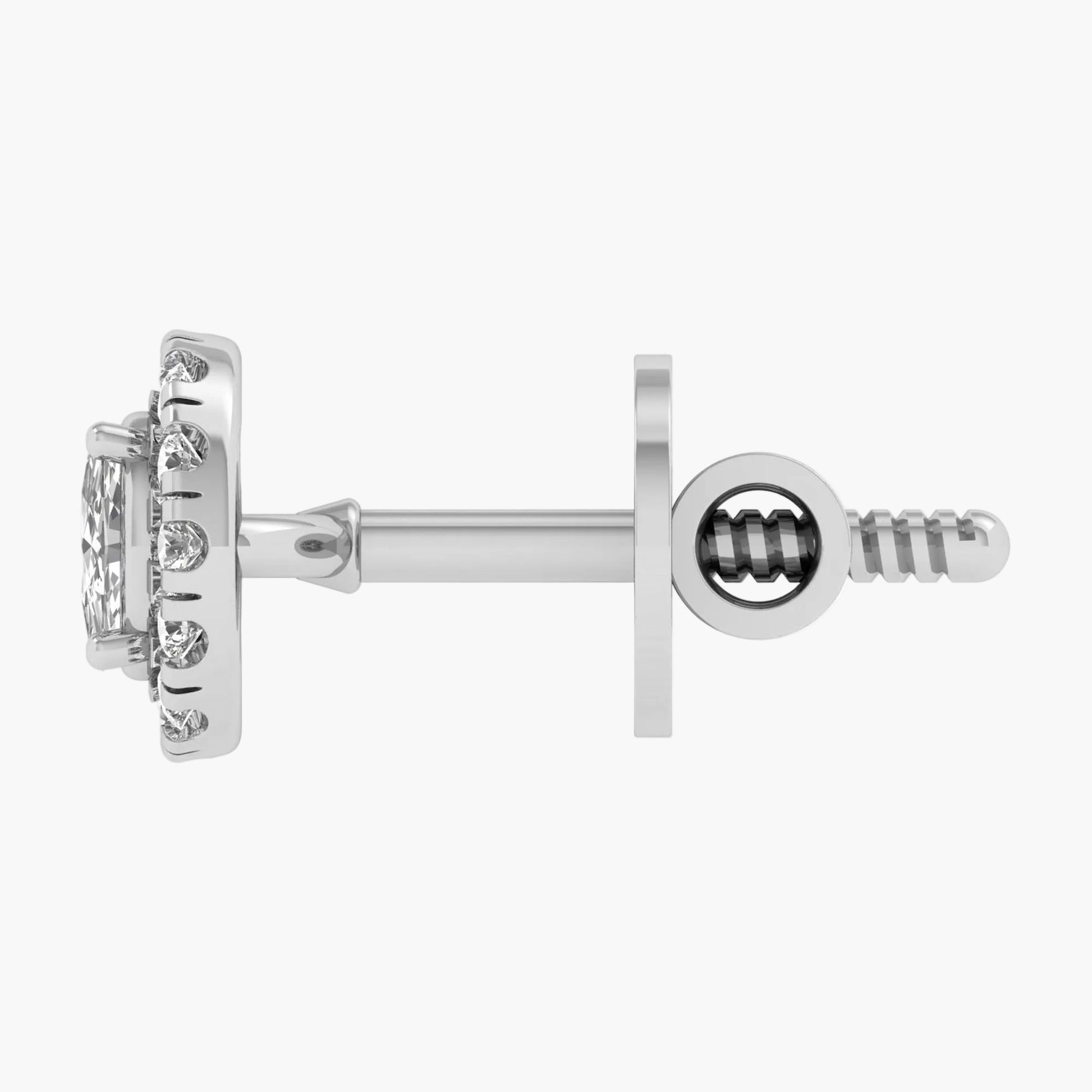 Close-up of a silver earring on a white background