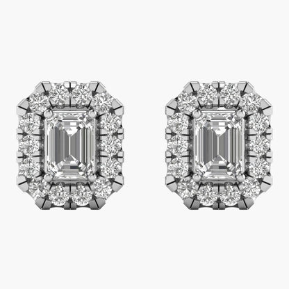 Pair of diamond earrings with emerald-cut center stones on a white background