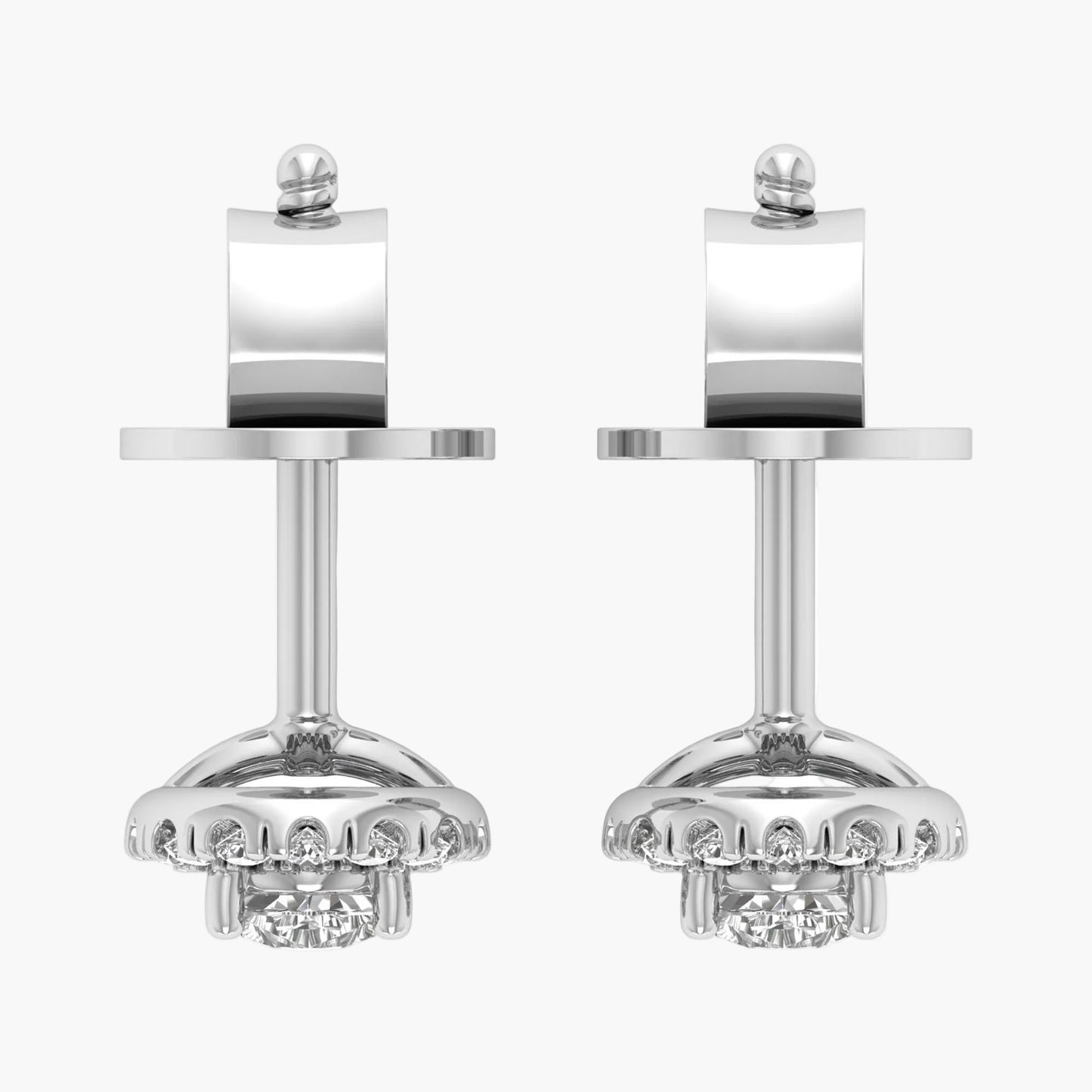 Pair of silver earrings with intricate designs on a white background