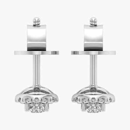 Pair of silver earrings with intricate designs on a white background