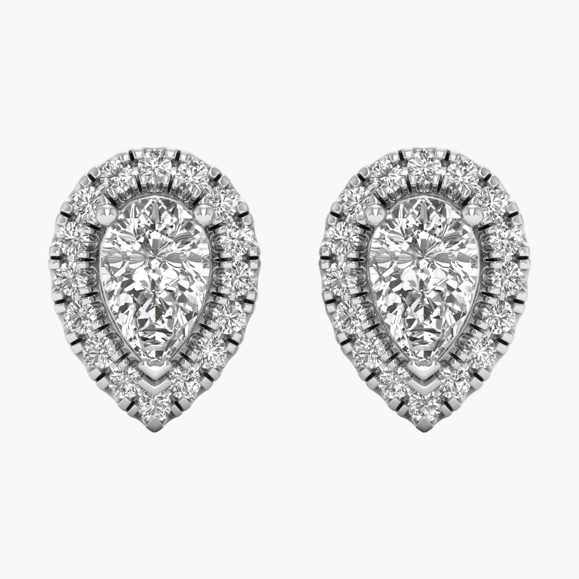 Pair of pear-shaped diamond earrings on a white background