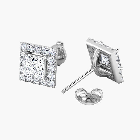 Diamond stud earrings on a white background