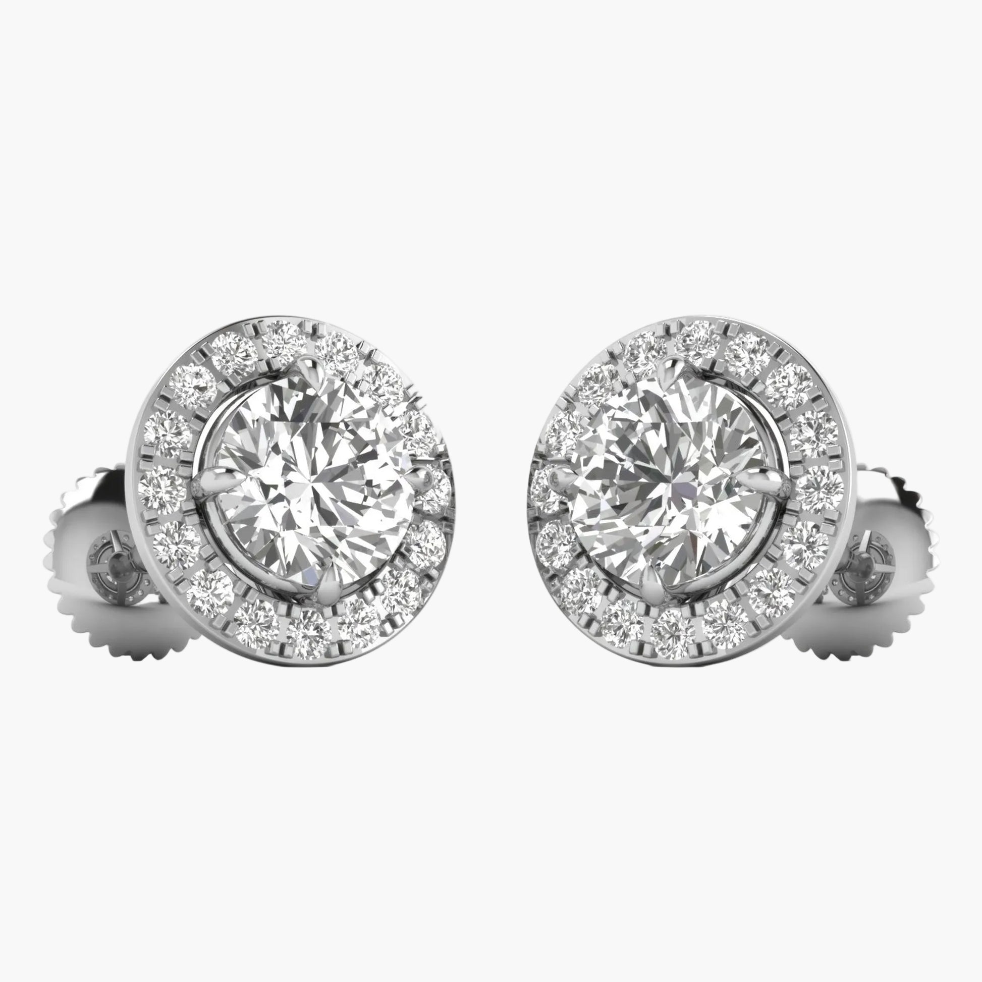Pair of diamond stud earrings on a white background