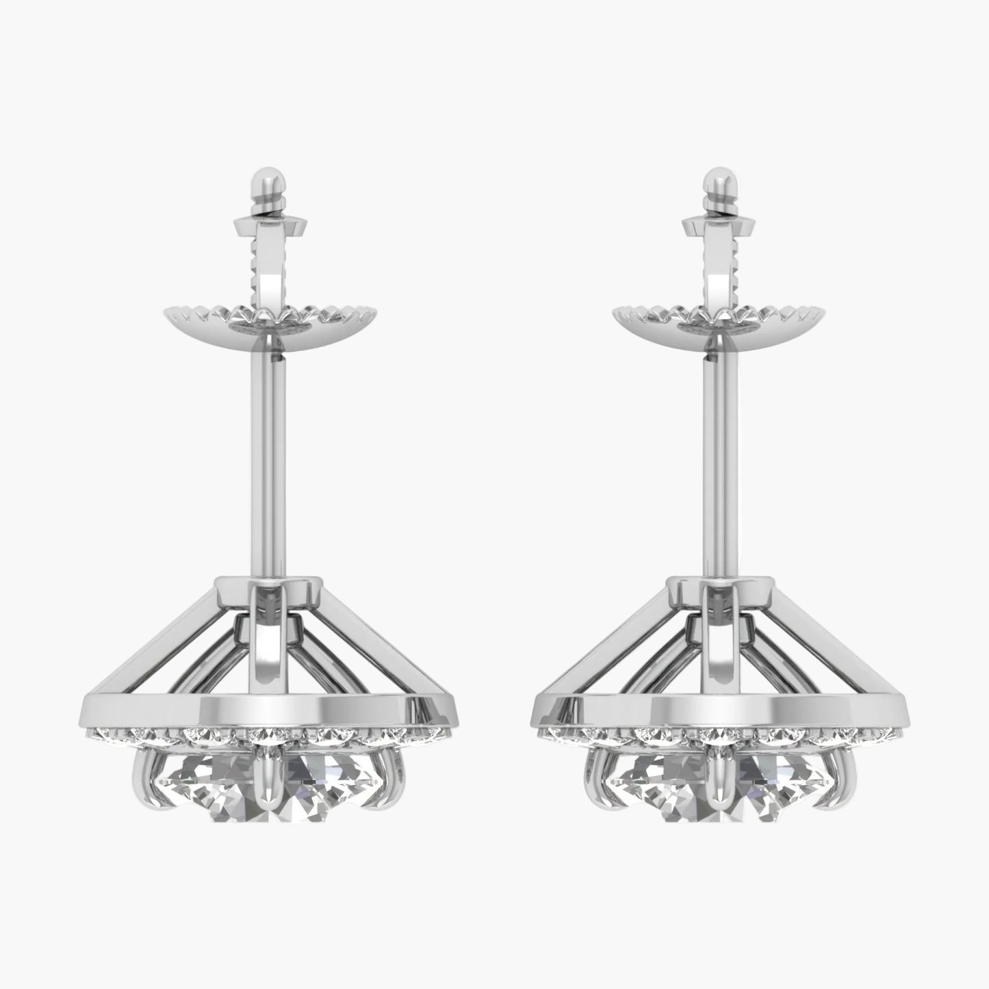 Pair of silver earrings with intricate designs on a white background