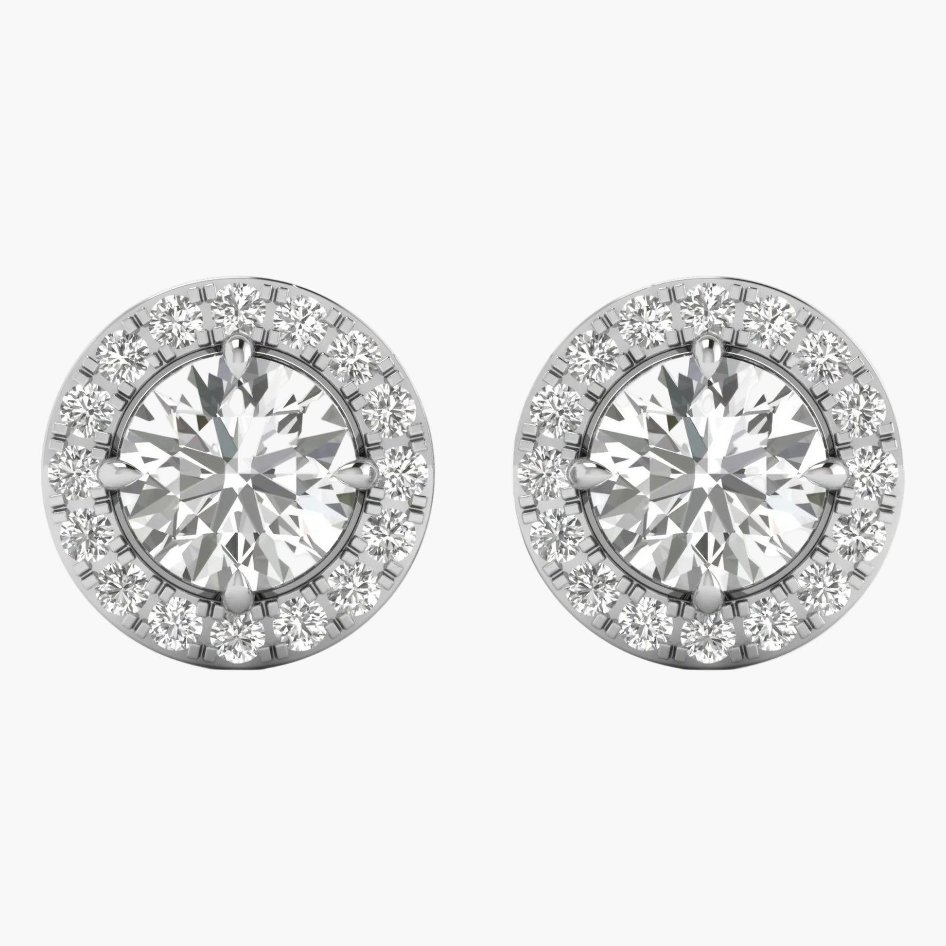 Pair of diamond stud earrings on a white background