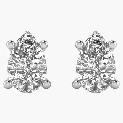 Pair of pear-shaped diamond stud earrings on a white background