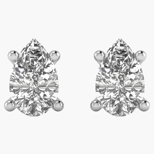Pair of pear-shaped diamond stud earrings on a white background