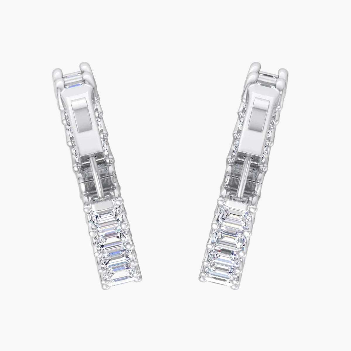 Pair of diamond earrings on a white background