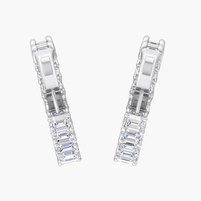 Pair of diamond earrings on a white background
