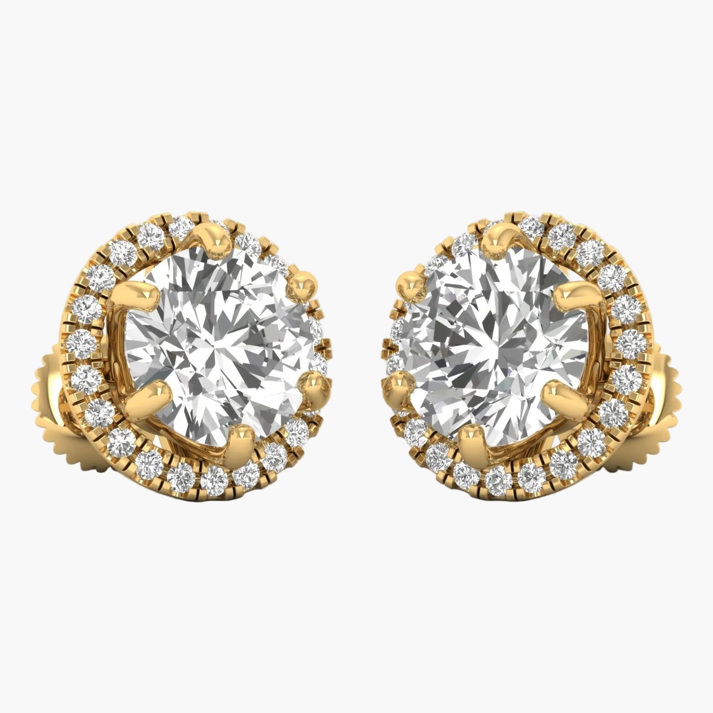 Gold earrings with large central gemstones and smaller diamonds on a white background