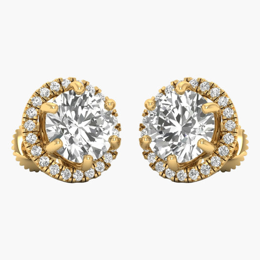 Gold earrings with large central gemstones and smaller diamonds on a white background