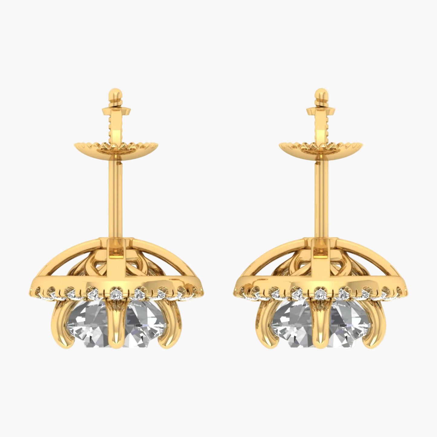 Gold earrings with clear gemstones on a white background