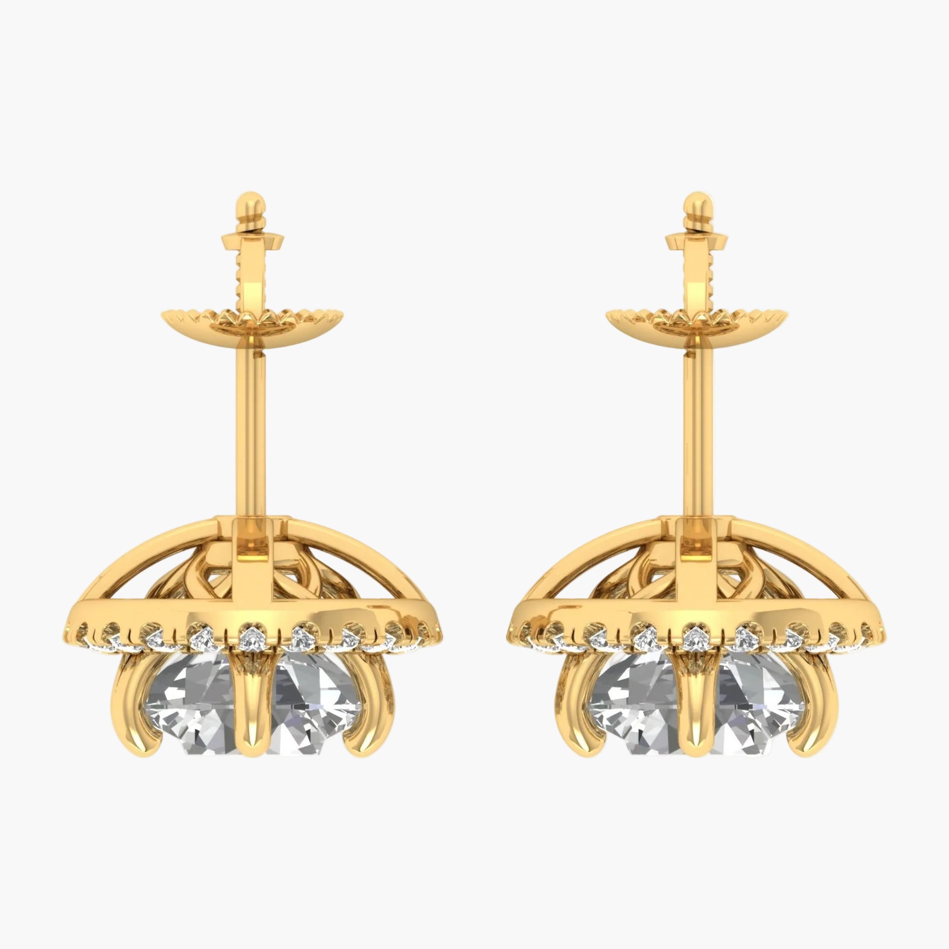 Gold earrings with clear gemstones on a white background